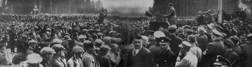 Adolf Hitler opens the second Arbeitsschlacht (labor battle) at the Unterhaching Reichsautobahn construction site near Munich in front of around 10,000 people
